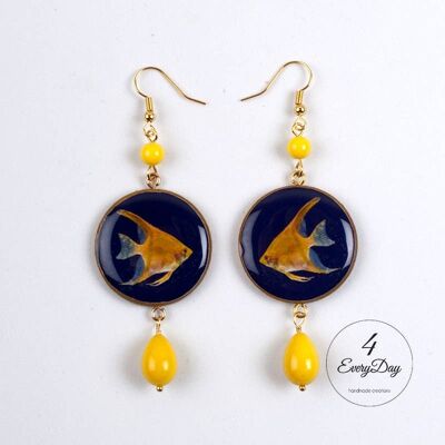 Earrings: yellow fish on a black background