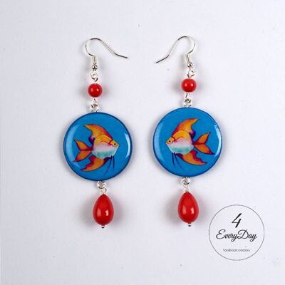 Earrings: orange fish on a light blue background