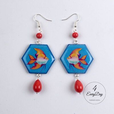 Earrings: orange fish on a light blue hexagon background