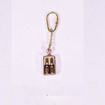 Porte-clés poulie dorée