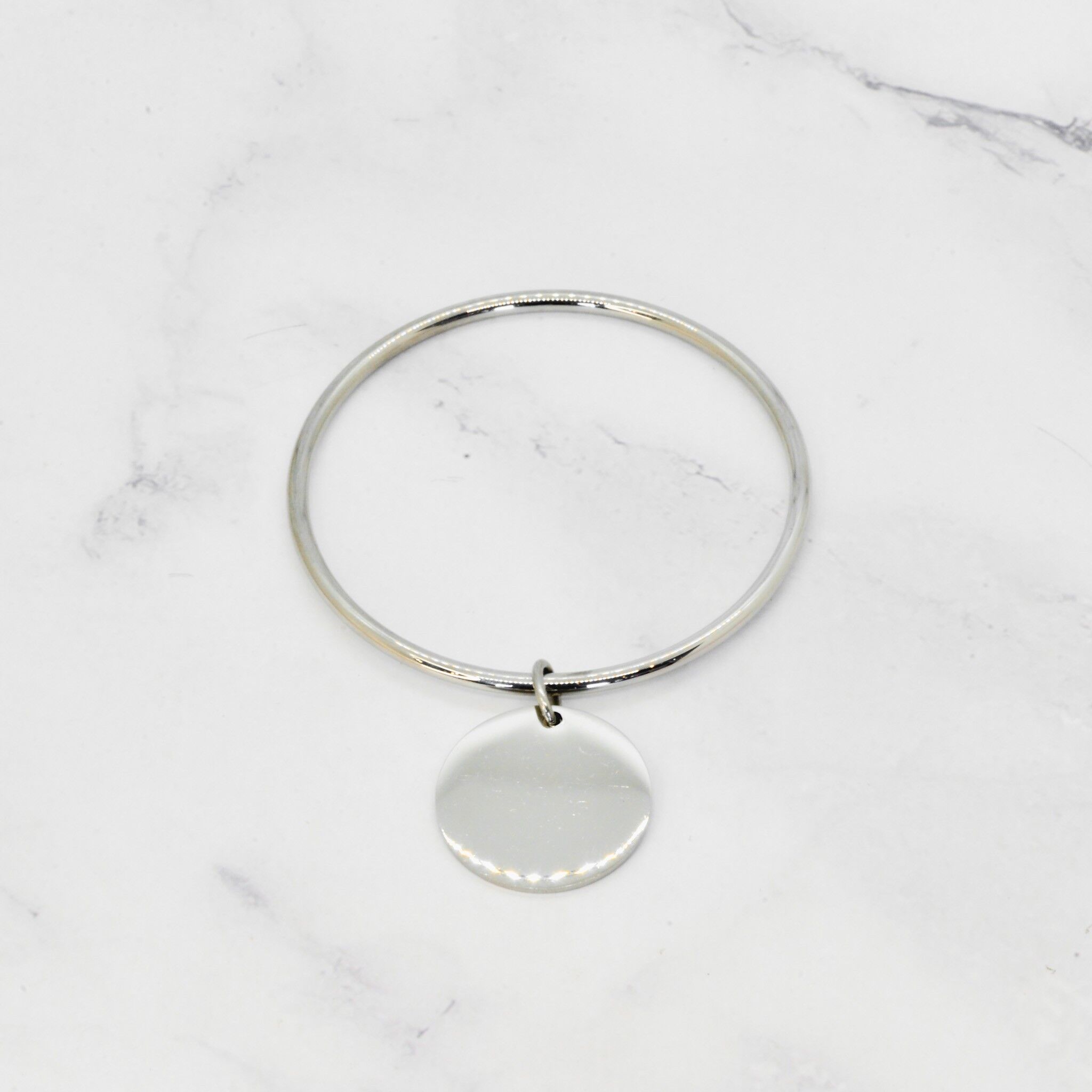 Quastenarmreif aus Stahl 27mm