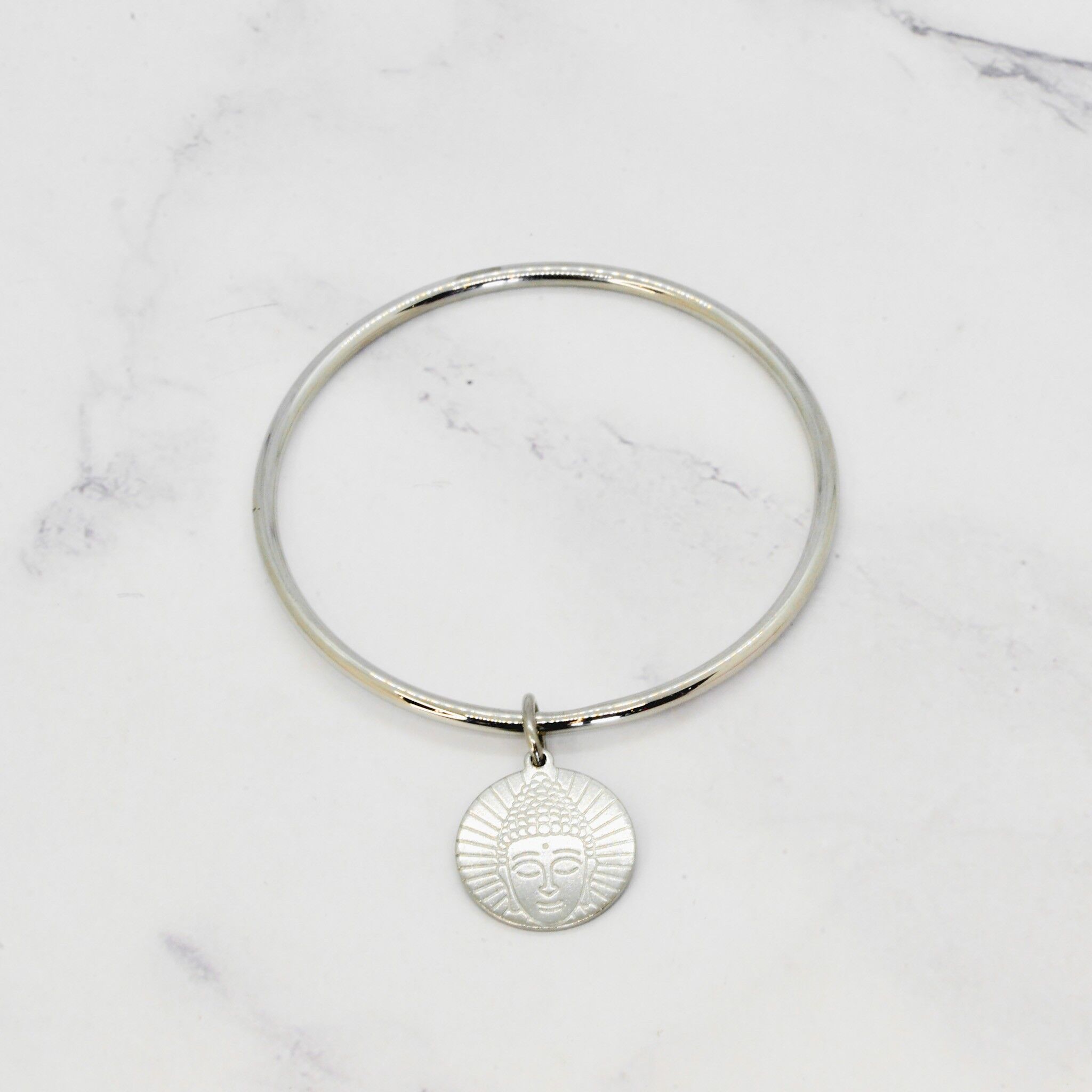 Bracciale rigido con nappa buddha in acciaio