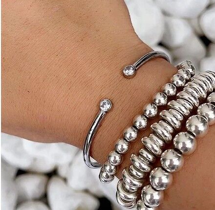 Bracciale rigido aperto in acciaio zircone