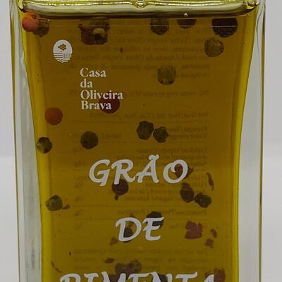 Olivenöl mit Pfefferkörnern