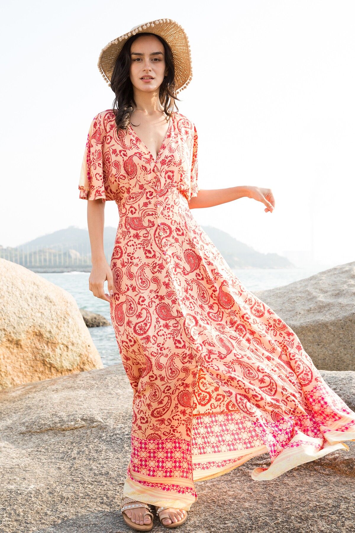 Buy wholesale Long buttoned dress in print with V neck and cap