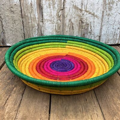 30 cm flat bowl of multicolored natural raffia.