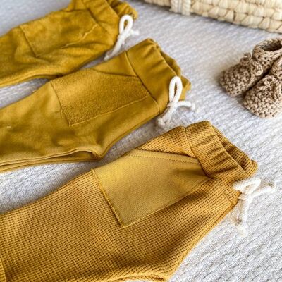 Pantaloni della tuta per bebè / giallo sole