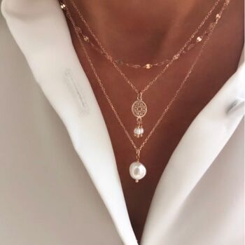 Collier perle ornement 1
