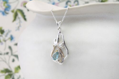 TEARDROP BLUE TOPAZ AND PEARL PENDANT