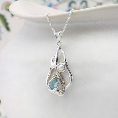 TEARDROP BLUE TOPAZ AND PEARL PENDANT