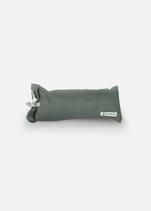 Green eye pillow filled with lavender herbs