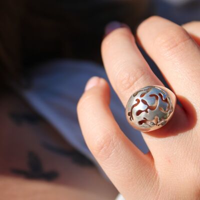 Organic ball ring in solid silver contemporary jewelry collection Impermanence