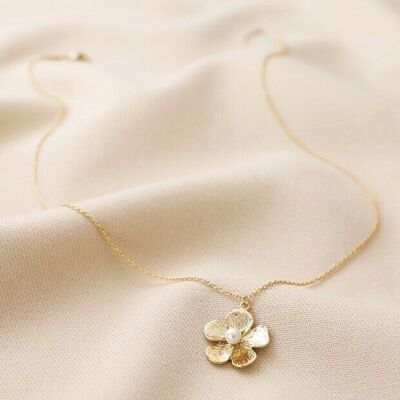 Große Halskette mit Blumenanhänger und Perle in Gold