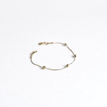 Collection CIRCUS - Bracelet - Quatre perles de métal 1