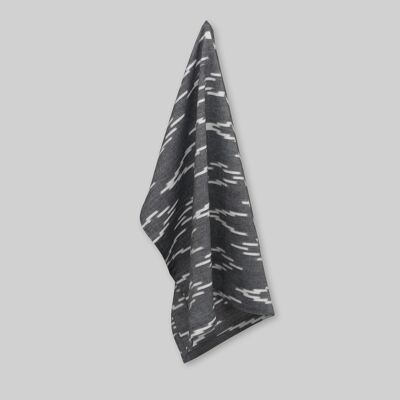Tea towel, handwoven ikat, ecru v-pattern on black
