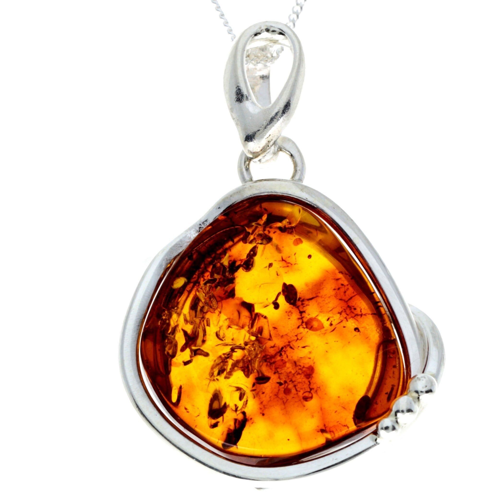Exklusiver einzigartiger Anhänger aus 925er Sterlingsilber und echtem baltischen Bernstein in Cognac – PD2349