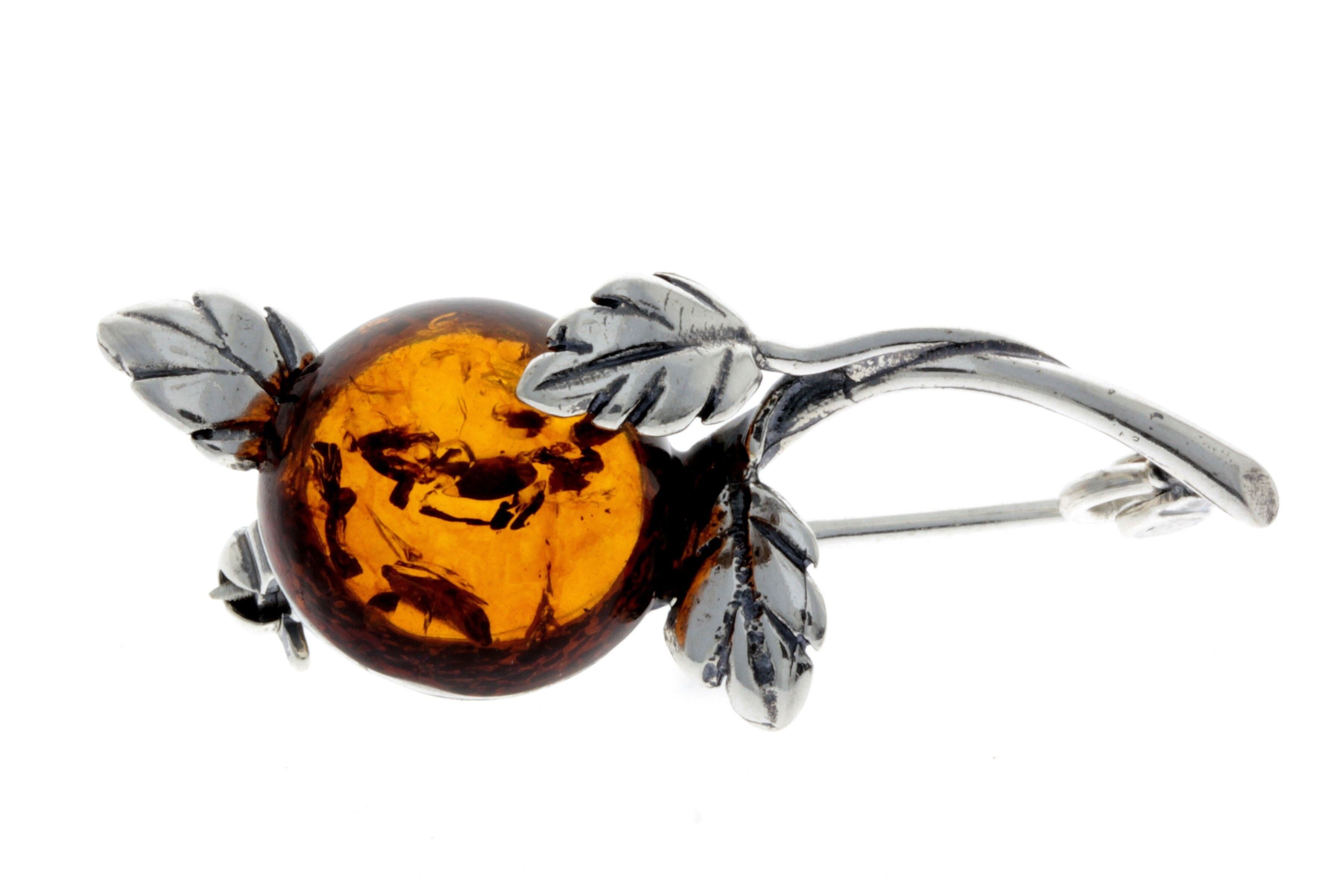 Vintage sterling and carved amber brooch • sold WS3