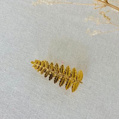 Small golden hair clip Hermione