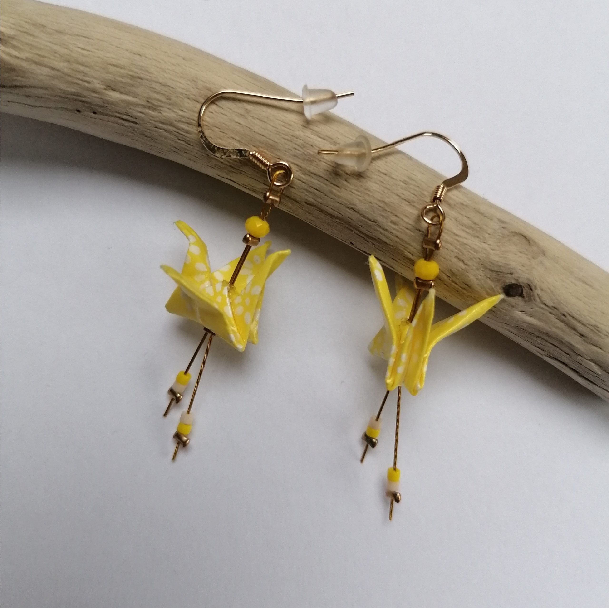 Orecchini con gru a margherita