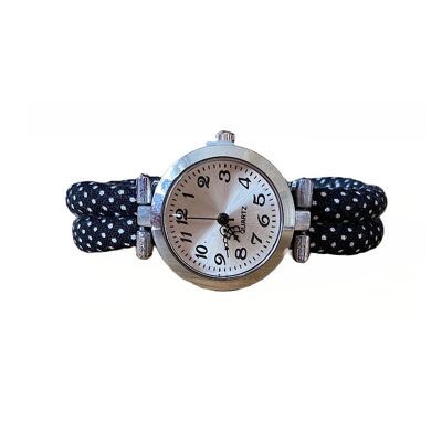 Black fabric watch with white weights, magnetic clasp.