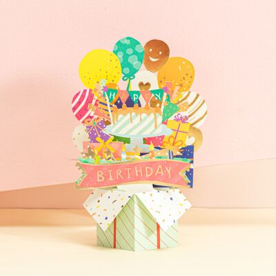 Pop-up verjaardagskaart vol cadeautjes in doos, ballon en confetti