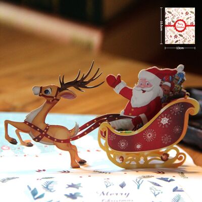 Tarjeta de Navidad emergente Feliz Papá Noel en un trineo de renos