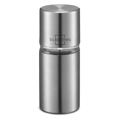 Nutmeg grinder with stainless steel grinder with storage compartment for up to 4 nutmegs