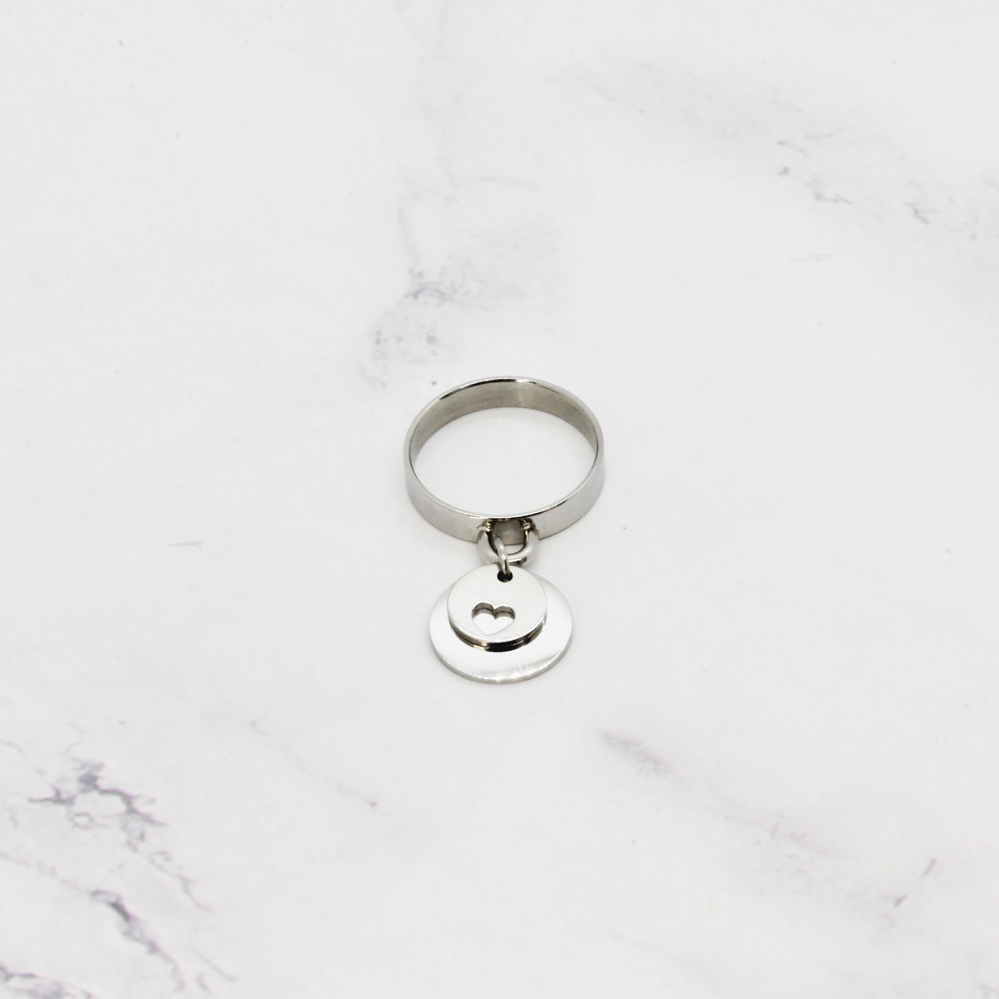 Anello con doppia nappa a cuore
acciaio forato - 3 mm