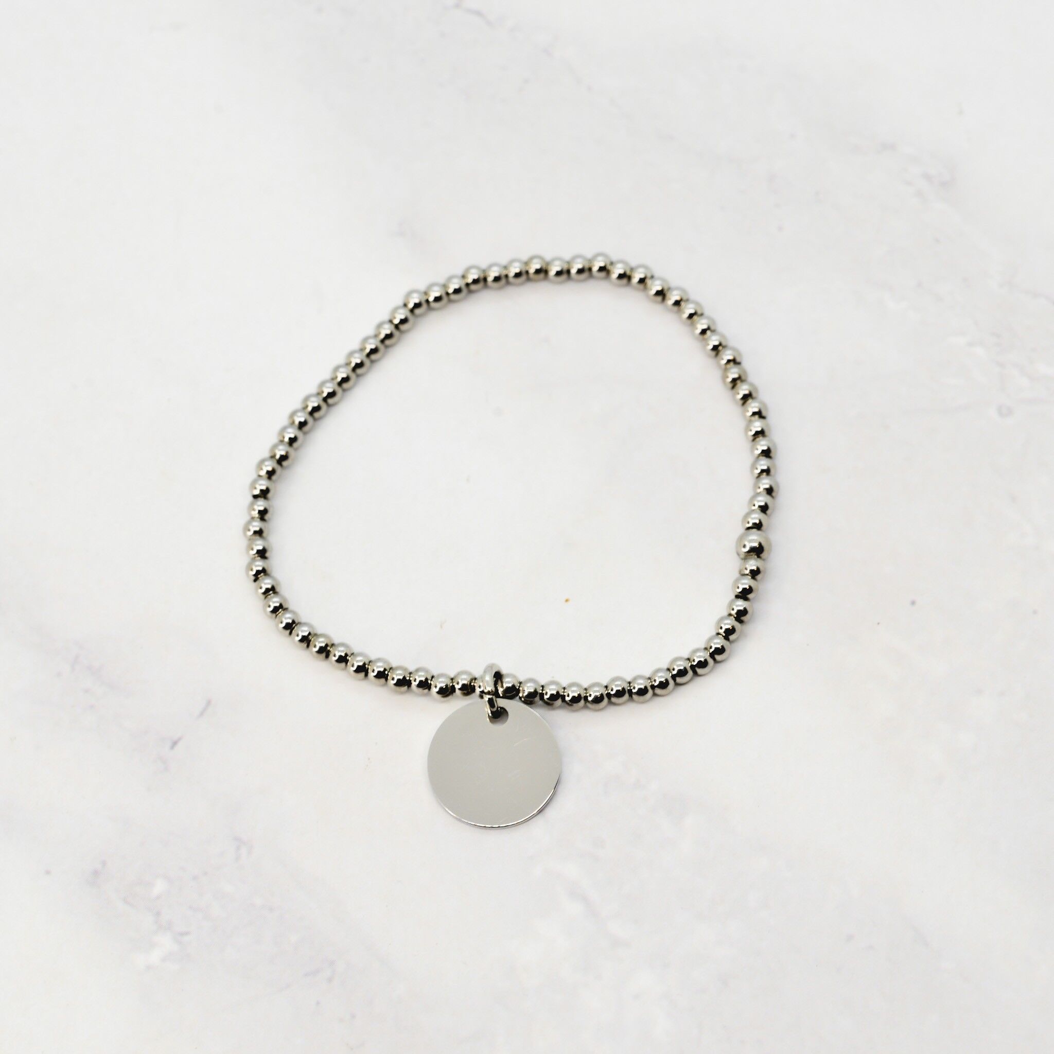 Bracelet élastique pampille acier