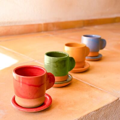 Red coffee cups and saucers