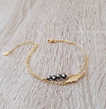 Bracelet double chaîne en or avec cristaux noirs 2