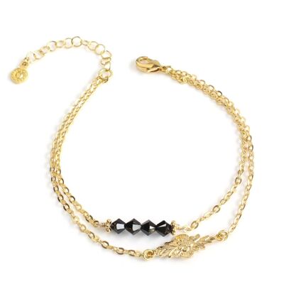 Gold double chain bracelet with black crystals