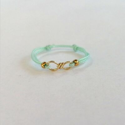 Turquoise infinity cord ring