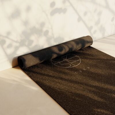 Black yoga mat made of natural rubber and cork