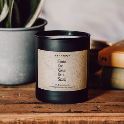 Scented candle with saying | Follow
One
Course
Until
Success | Soy wax candle in black glass