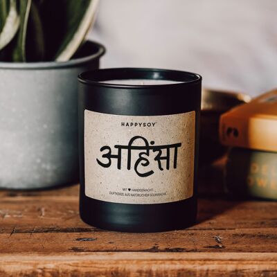 Scented candle with saying | Sign: Ahimsa (https://www.yogajournal.com/lifestyle/what-is-ahimsa) | Soy wax candle in black glass