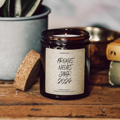 Scented candle with saying | Happy New Year 2024 | Soy wax candle in a glass jar with a cork lid