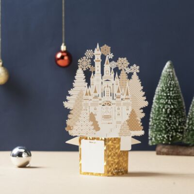 Cartolina di Natale bianca dorata con fiocchi di neve e albero di Natale