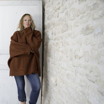 Oversized terracotta poncho sweater with pockets