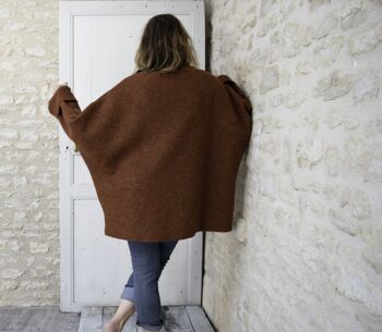 Oversized terracotta poncho sweater with pockets 5