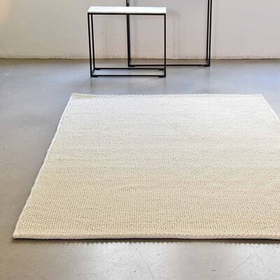 Rectangular hand-woven ecru curly wool rug 140 x 200 cm