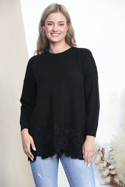 Black long sleeve jumper with spiral pattern