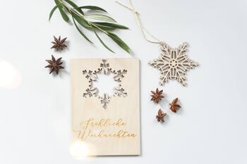 Carte postale de Noël avec flocon de neige suspendu 1