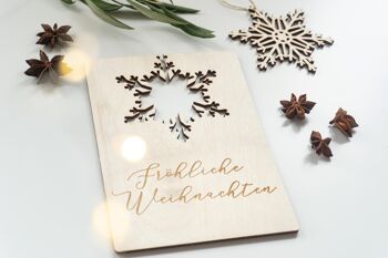 Carte postale de Noël avec flocon de neige suspendu 3
