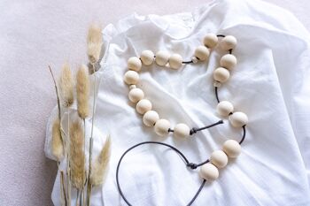 Chaîne arithmétique faite de grosses perles en bois