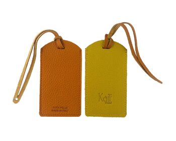 K0041LRB | Étiquette à bagage bicolore fabriquée en Italie en véritable cuir pleine fleur, grain dollar - Orange/Jaune - Dimensions : 6,5 x 12 cm - Emballage : fond/couvercle rigide Coffret cadeau 1