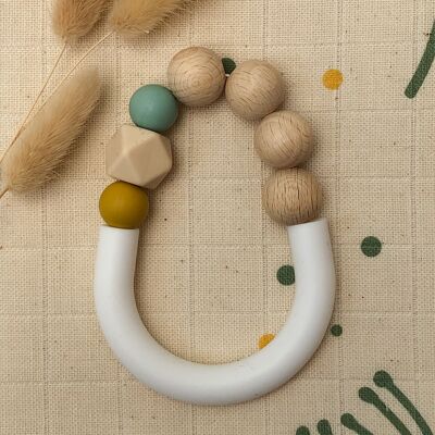 Yellow and water green teething ring in silicone and beech wood