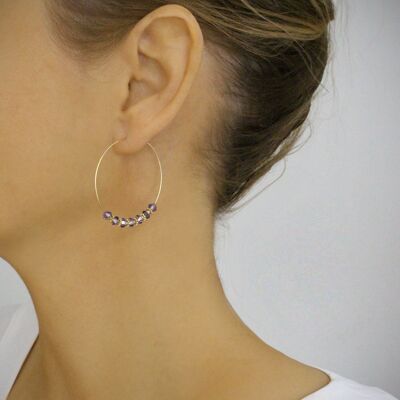 Gold hoop earrings with Tanzanite crystals
