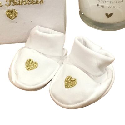 White baby booties with little heart