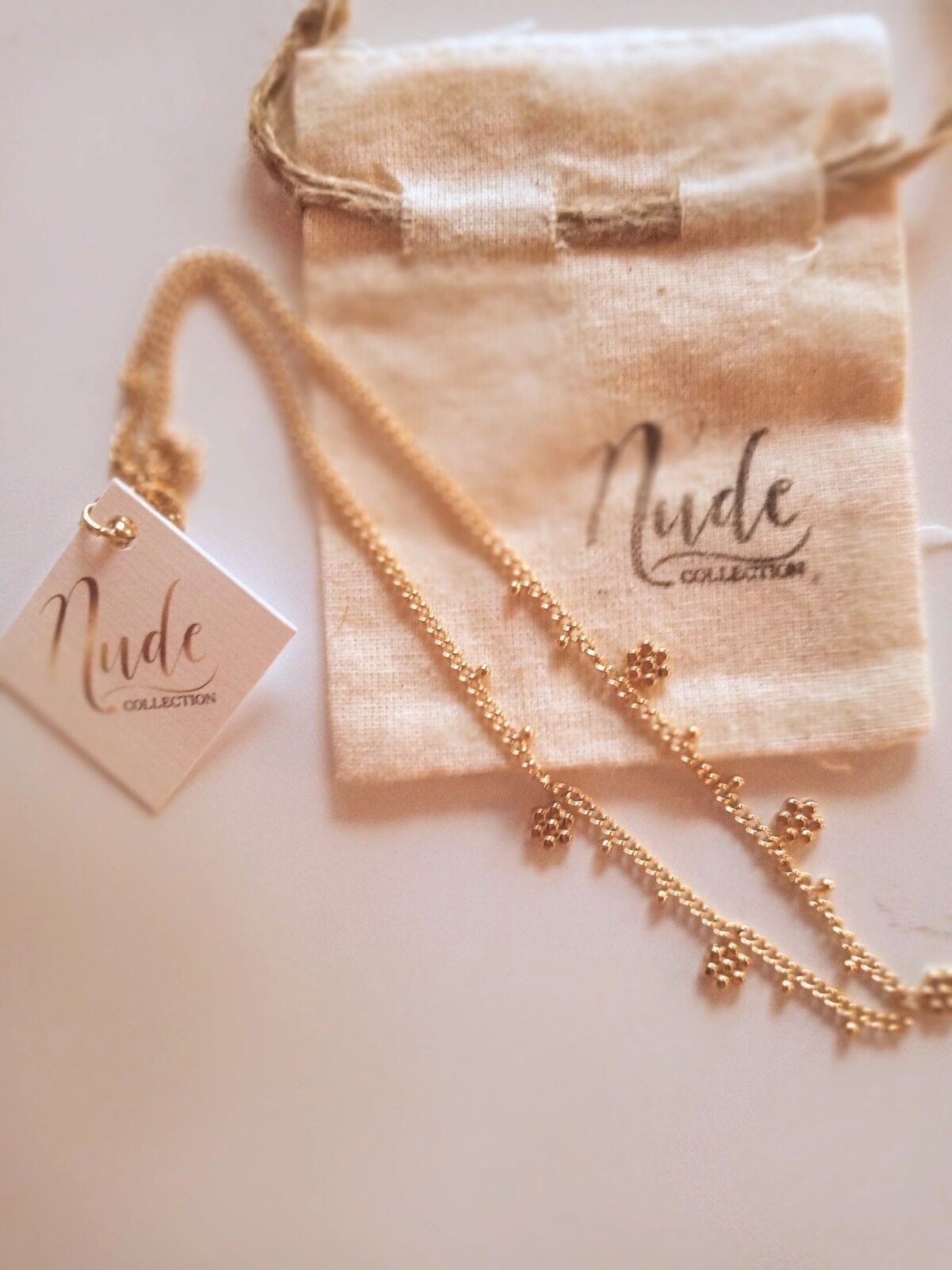 Collana in acciaio a tema fiore